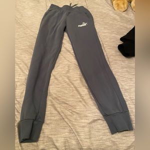 This is a brand new adult small puma jogger in a grey color way